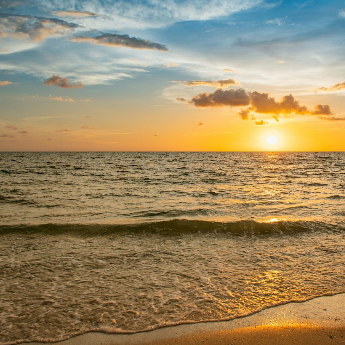 Vibrant sunset over the serene ocean. Naples Beach, Florida